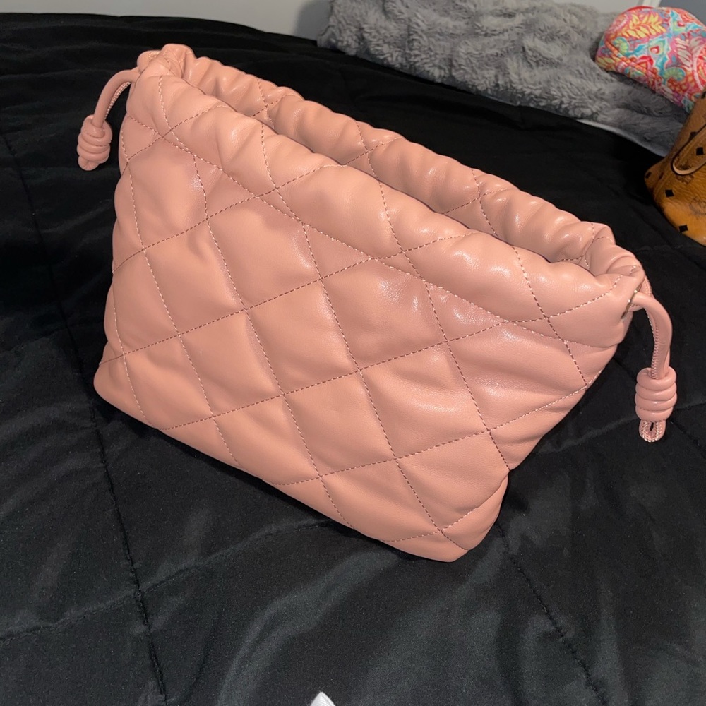 Pink clutch bag